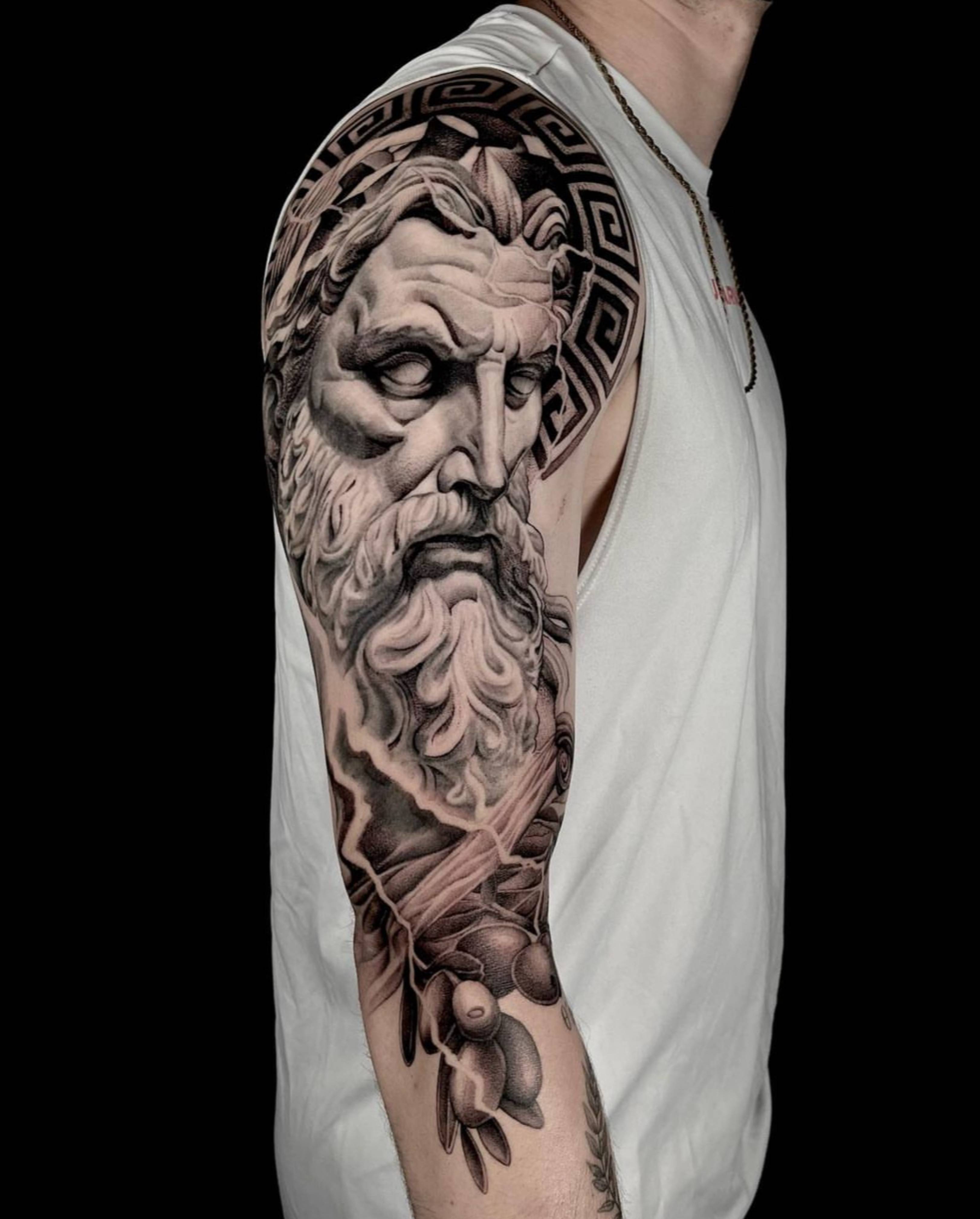 Zeus tattoo by Jon Nelson