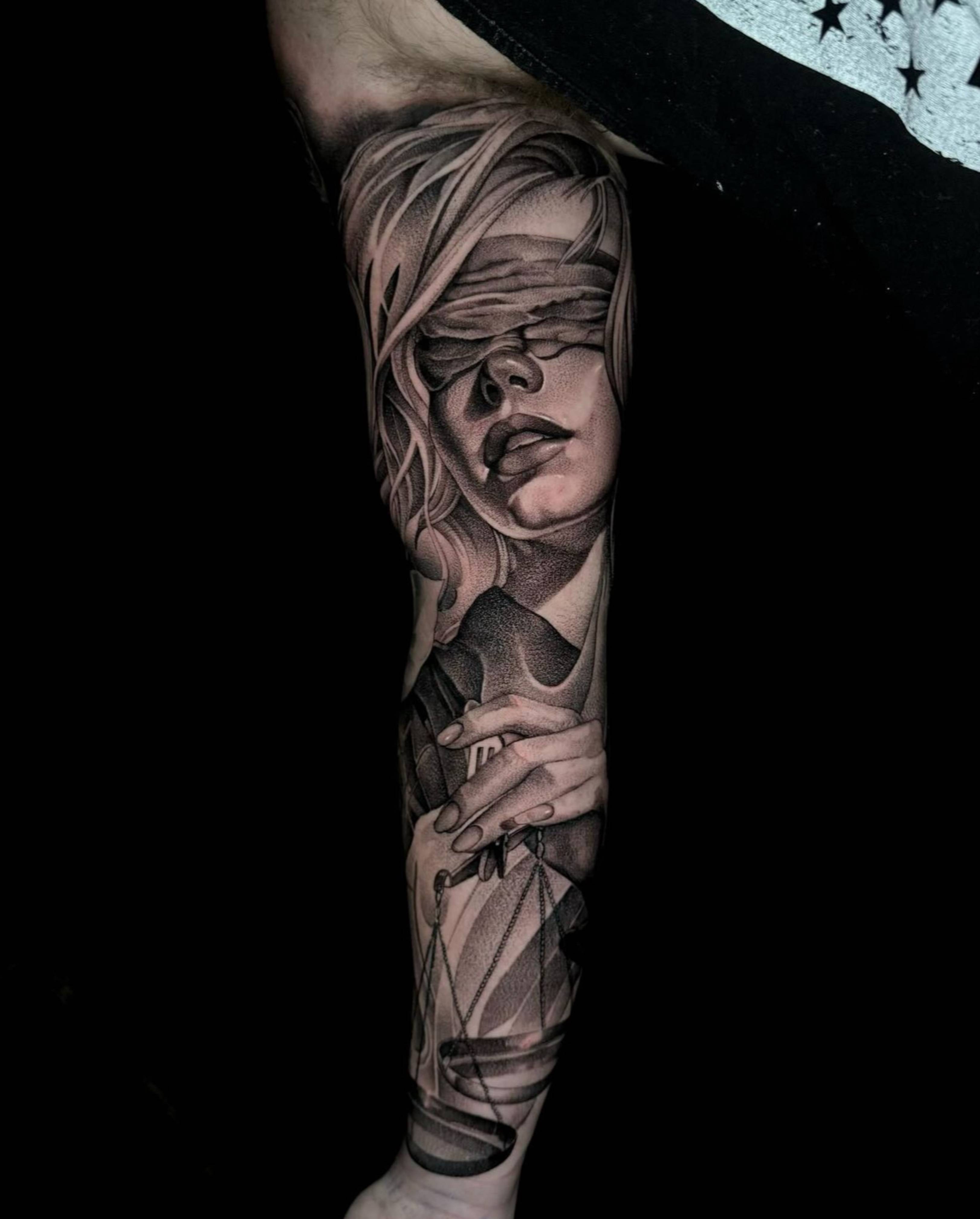 Lady Justice tattoo by Jon Nelson