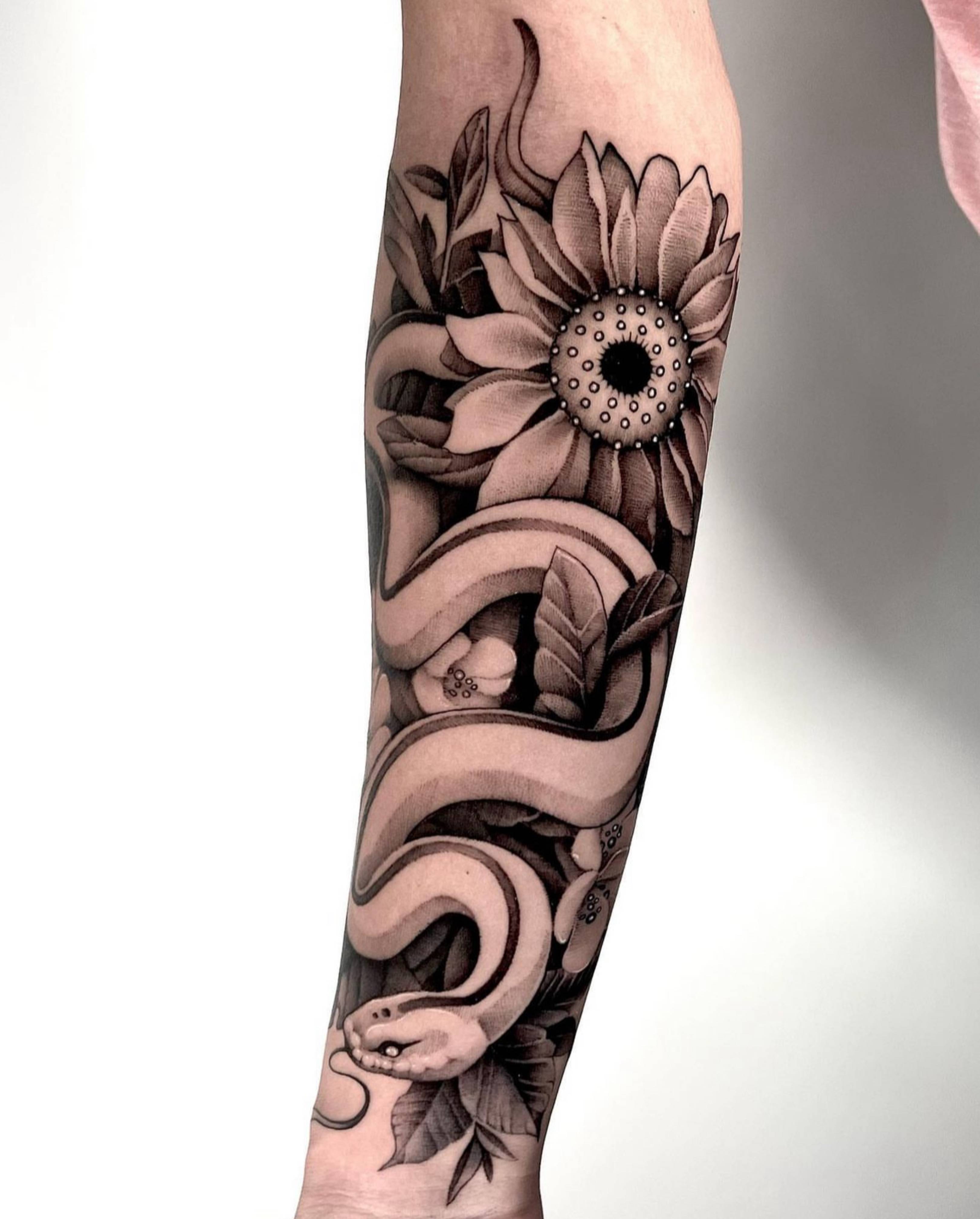 Floral and Snake tattoo by Jon Nelson